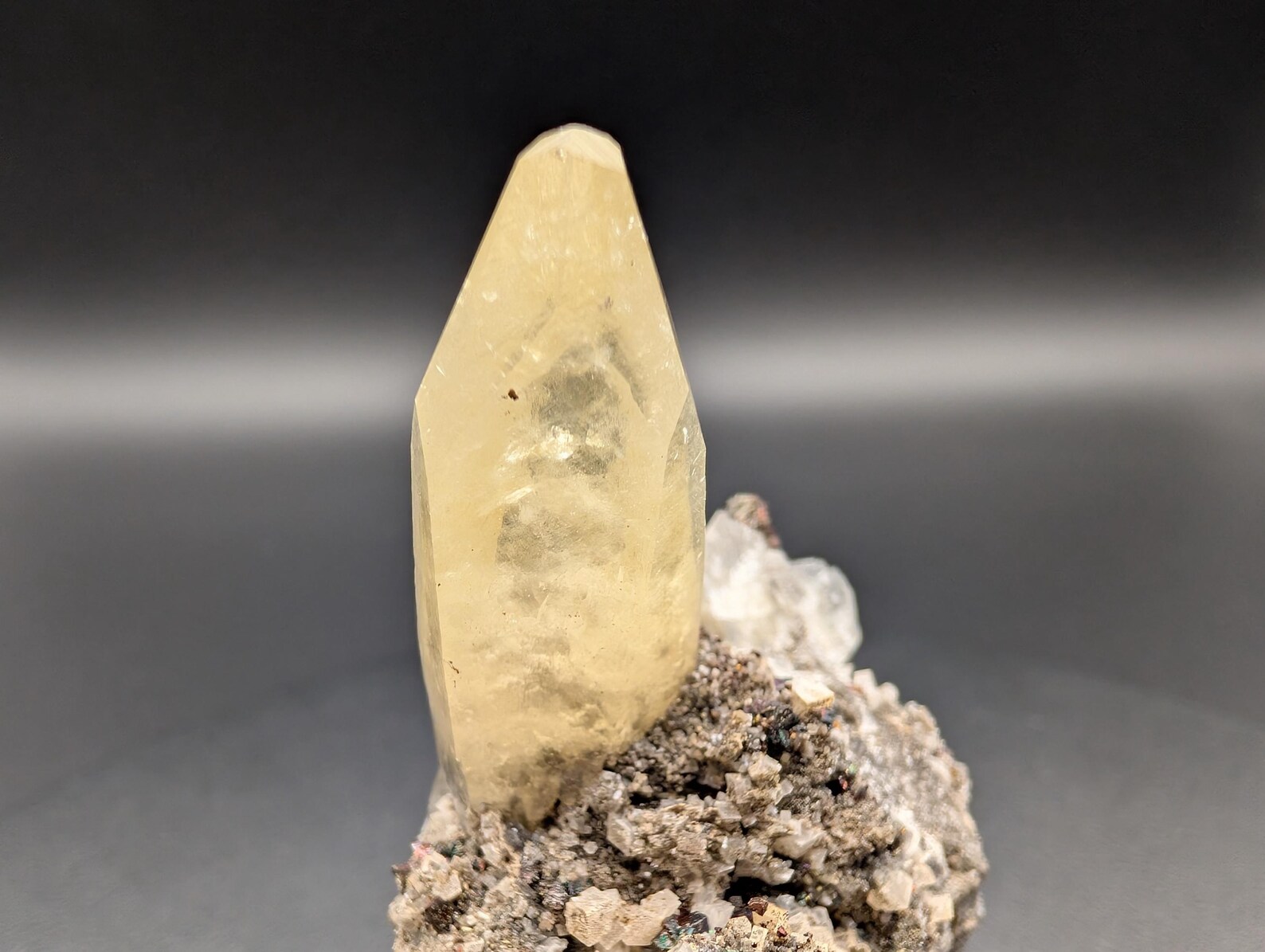 Calcite with Chalcopyrite – Solitaire Honey-Yellow Terminated Crystal on Iridescent Sulfide Matrix