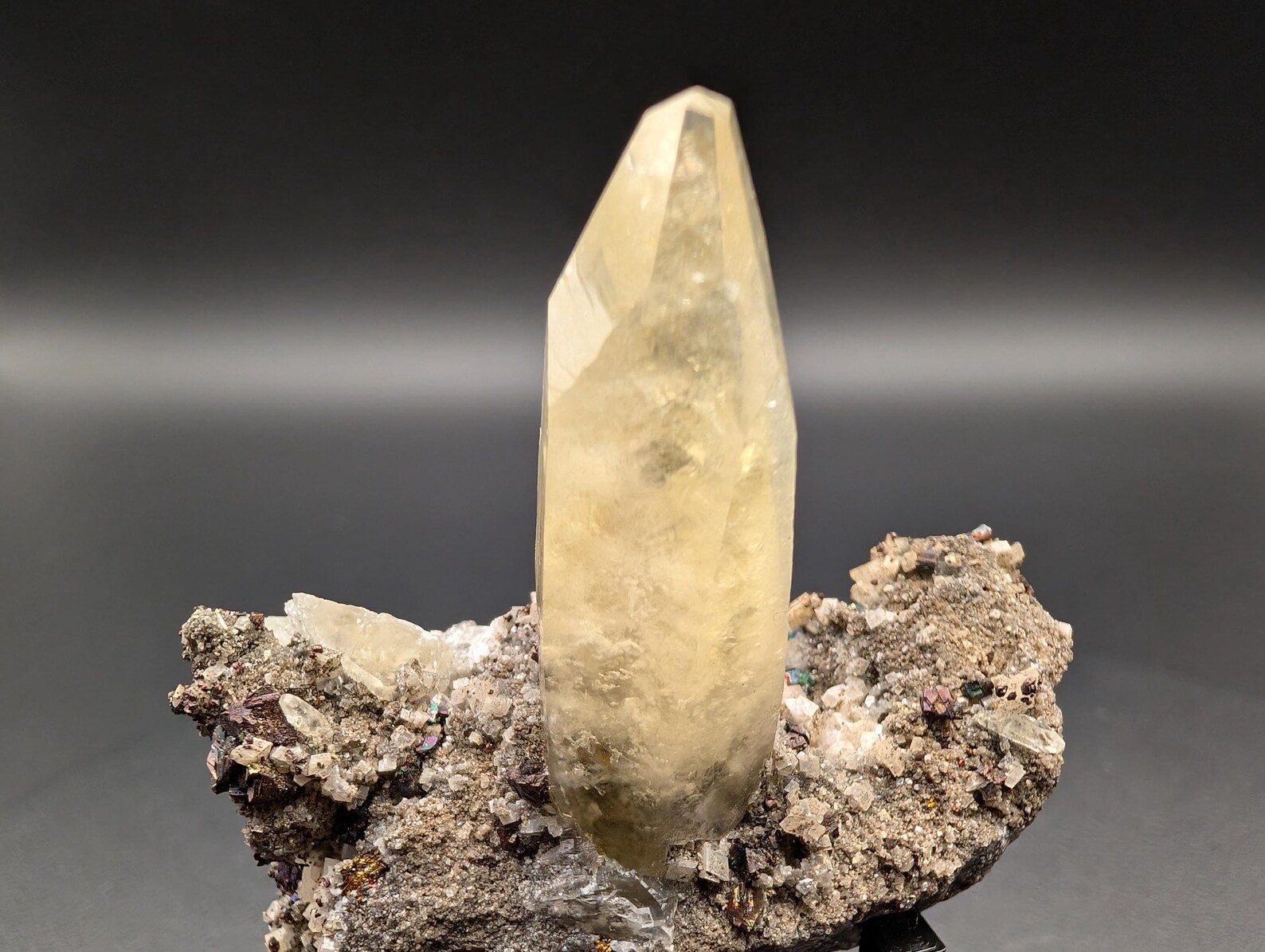 Calcite with Chalcopyrite – Solitaire Honey-Yellow Terminated Crystal on Iridescent Sulfide Matrix