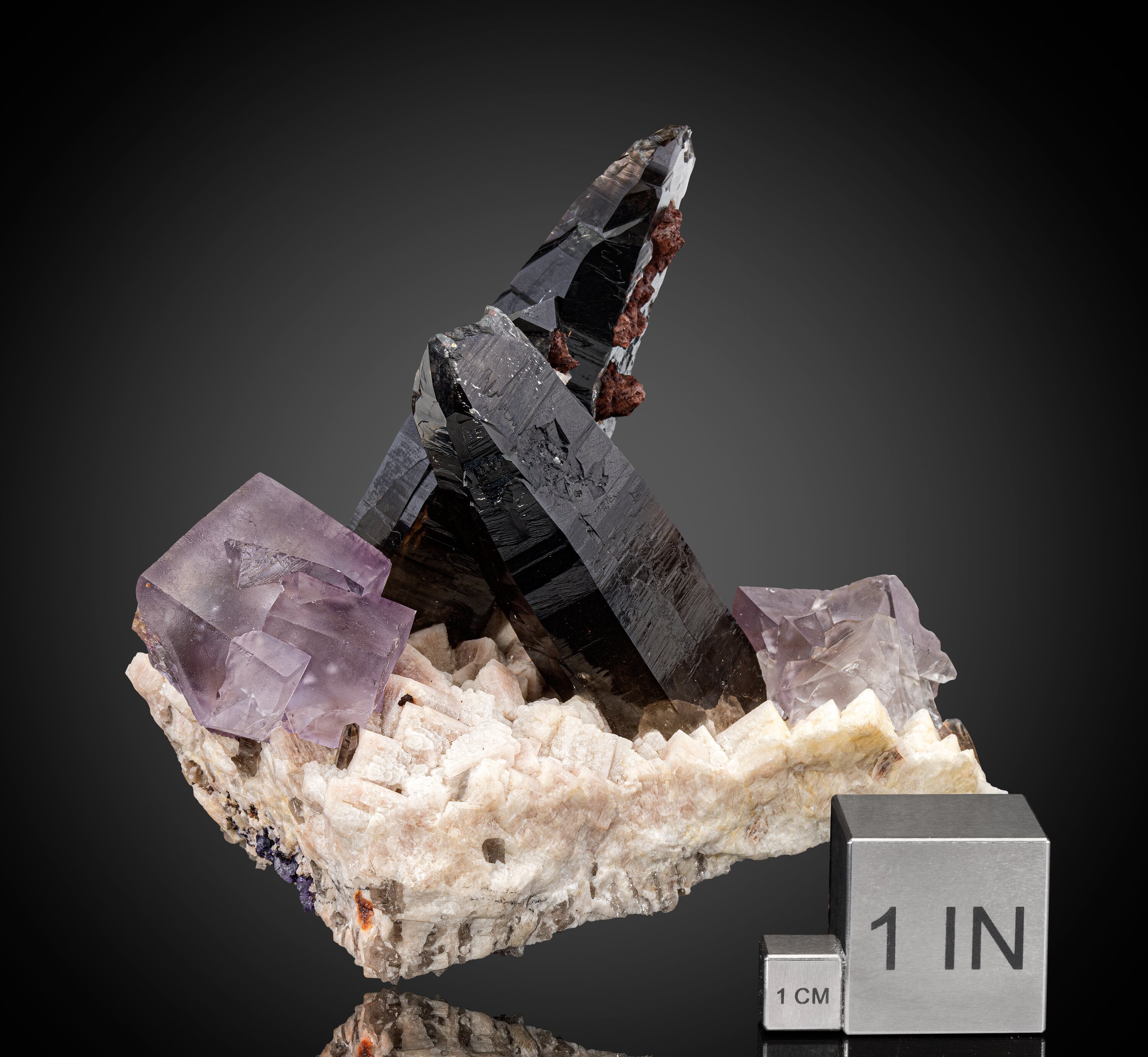 Twinned Fluorite and Smoky Quartz on Feldspar