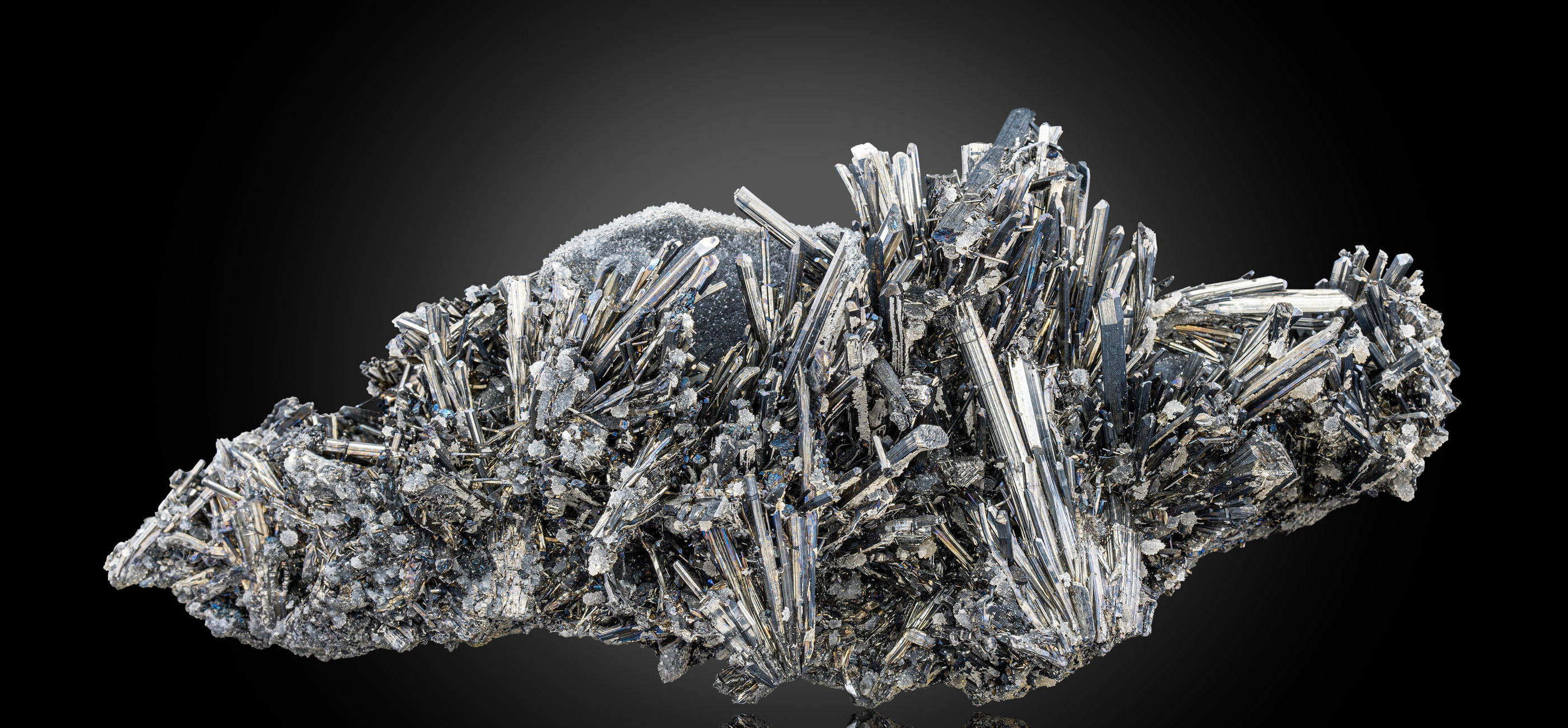 Stibnite on Chalcedony
